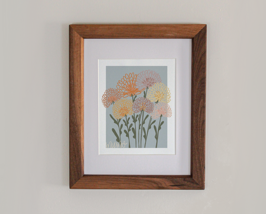 An art print line drawing of mums in bloom in a cherry hardwood frame