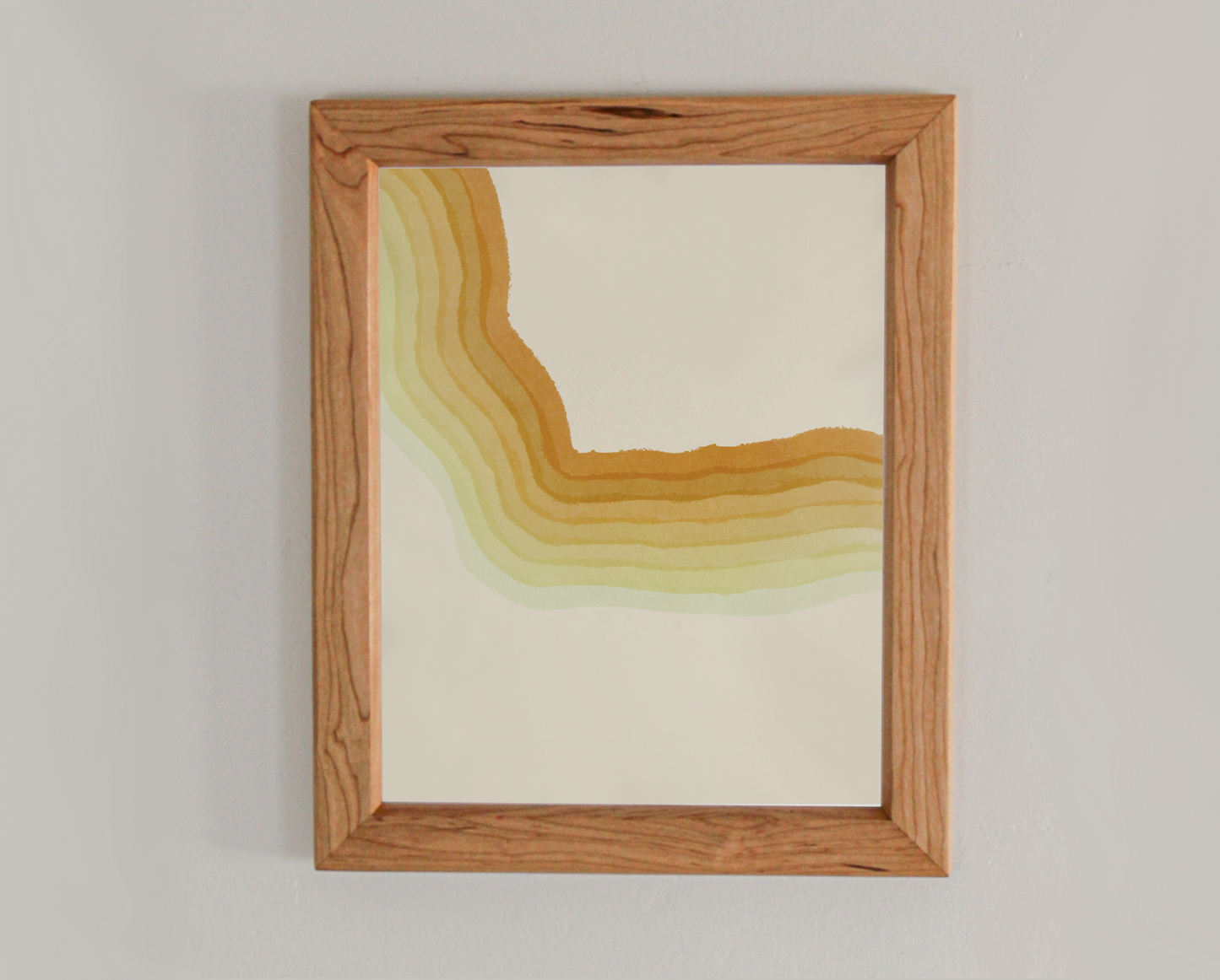 Abstract art print with various gradients of yellow in a cherry frame inspired by the crashing waves of the Atlantic coast