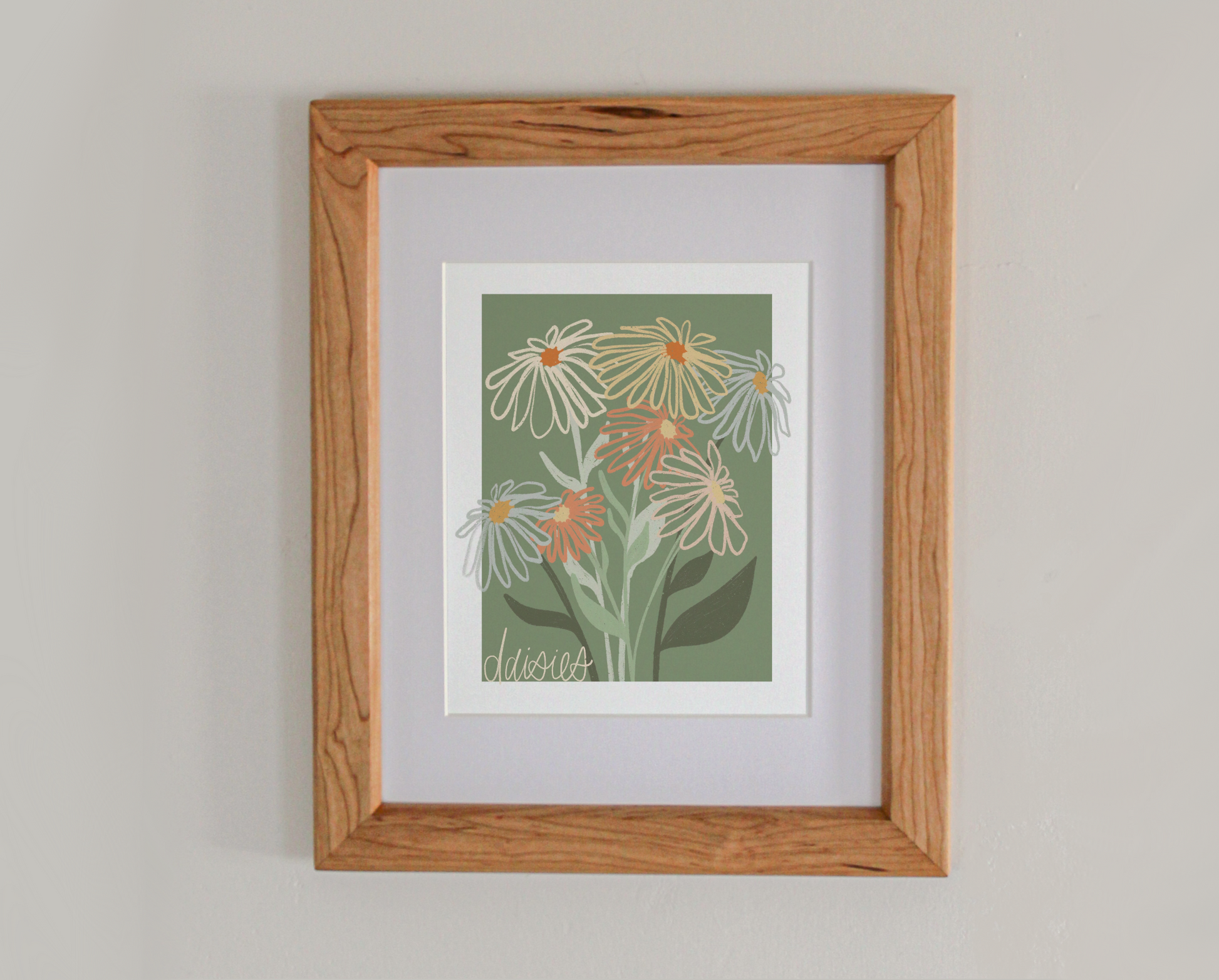 An art print line drawing of daisies in bloom in a cherry hardwood frame 